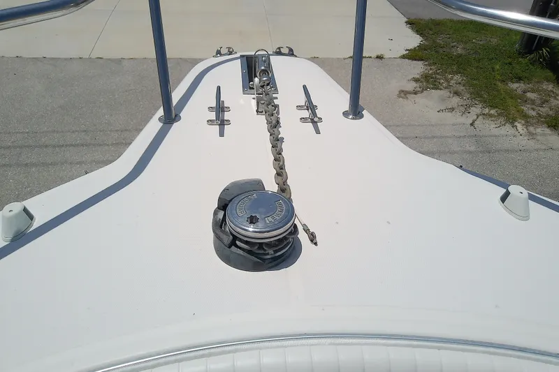 Slide: The Image of Bow of 2004 Stamas 310 Tarpon boat with anchor chain and windlass. - 28