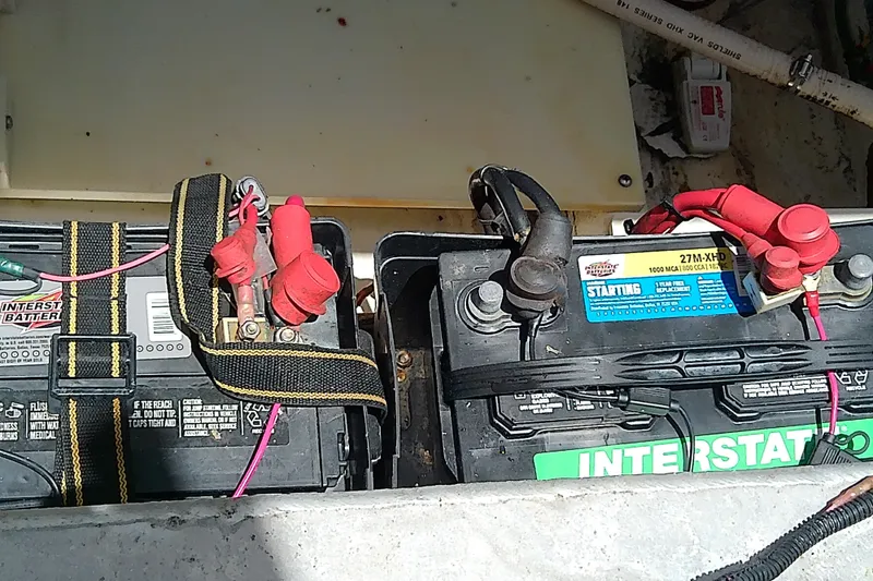 Slide: The Image of Two Interstate marine batteries in a 2004 Stamas 310 Tarpon boat. - 53