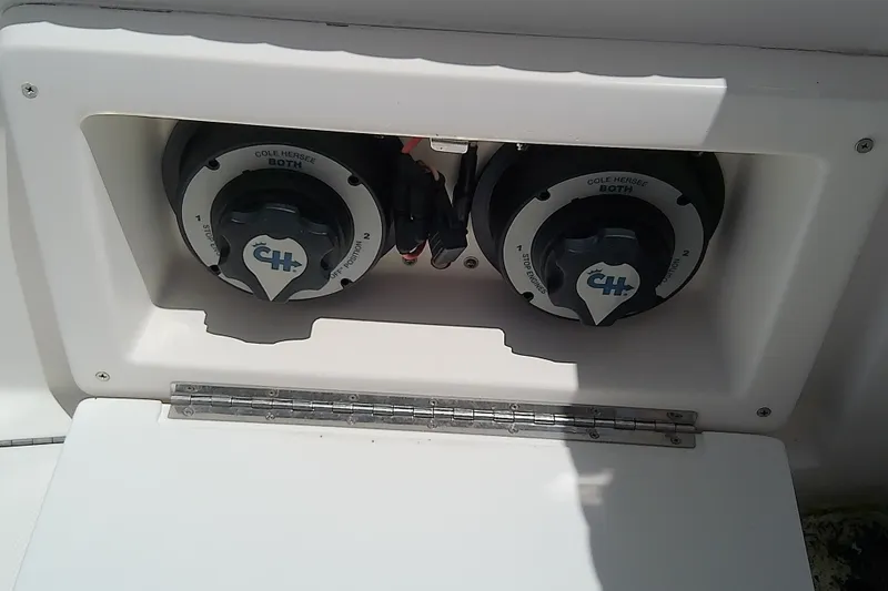 Slide: The Image of Battery switches on a 2004 Stamas 310 Tarpon boat, featuring Cole Hersee components. - 37