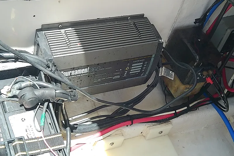 Slide: The Image of Battery charger setup in a 2004 Stamas 310 Tarpon boat. - 55