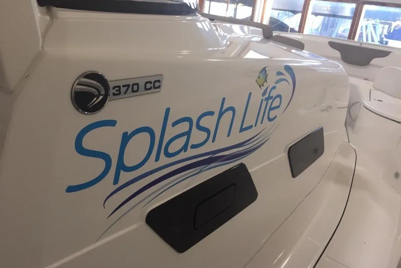 Slide: The Image of 2018 Edgewater 370CC boat with "Splash Life" decal on the side. - 13