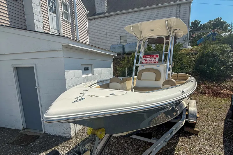 Slide: The Image of 2019 Key West 203 FS boat on trailer, parked beside a building, for sale. - 3