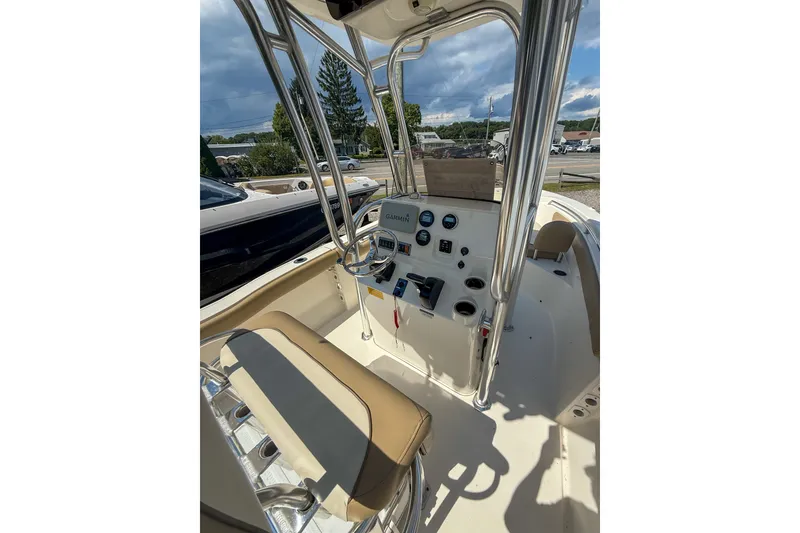 Slide: The Image of 2019 Key West 203 FS boat interior with steering console and seating. - 5