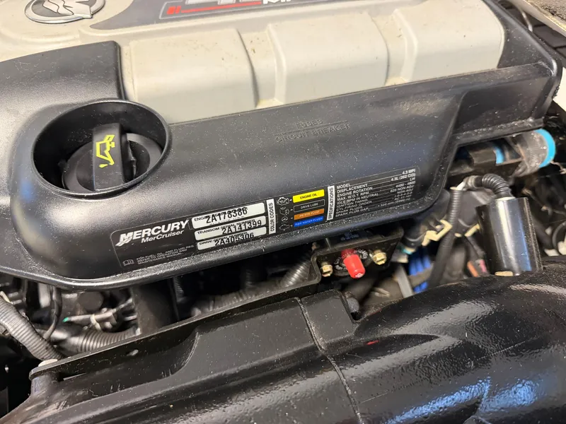 Slide: The Image of Close-up of a Mercury engine in a 2015 Starcraft 220 STARSTEP boat. - 16
