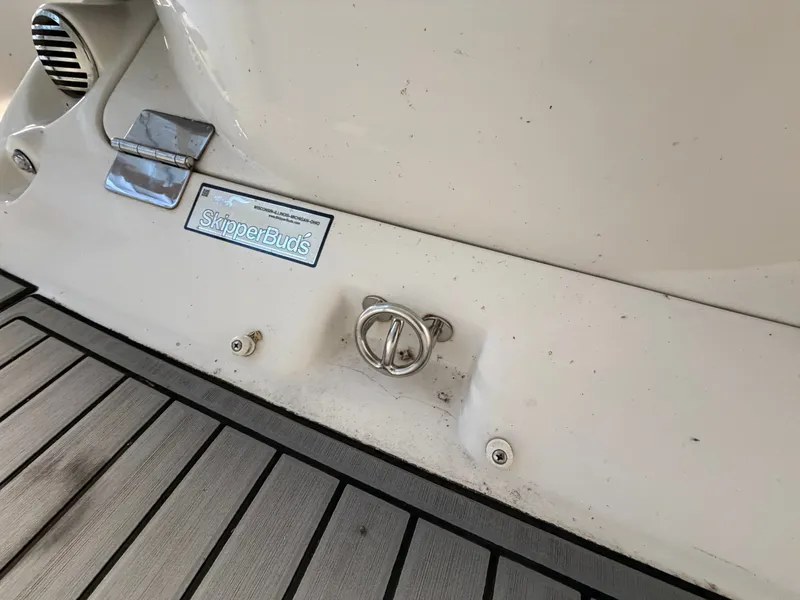 Slide: The Image of Close-up of the stern of a 2015 Starcraft 220 STARSTEP with wooden flooring. - 13