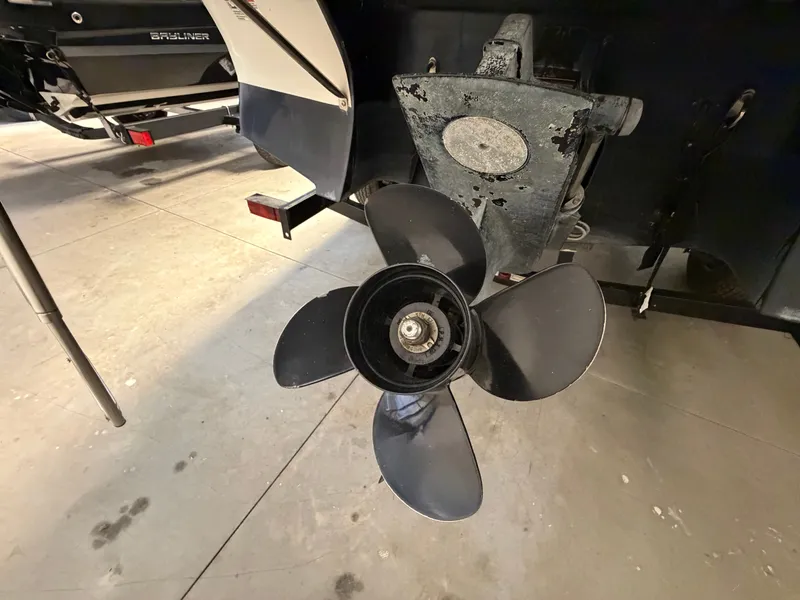 Slide: The Image of Close-up of a four-blade boat propeller mounted on a 2015 Starcraft 220 STARSTEP. - 10