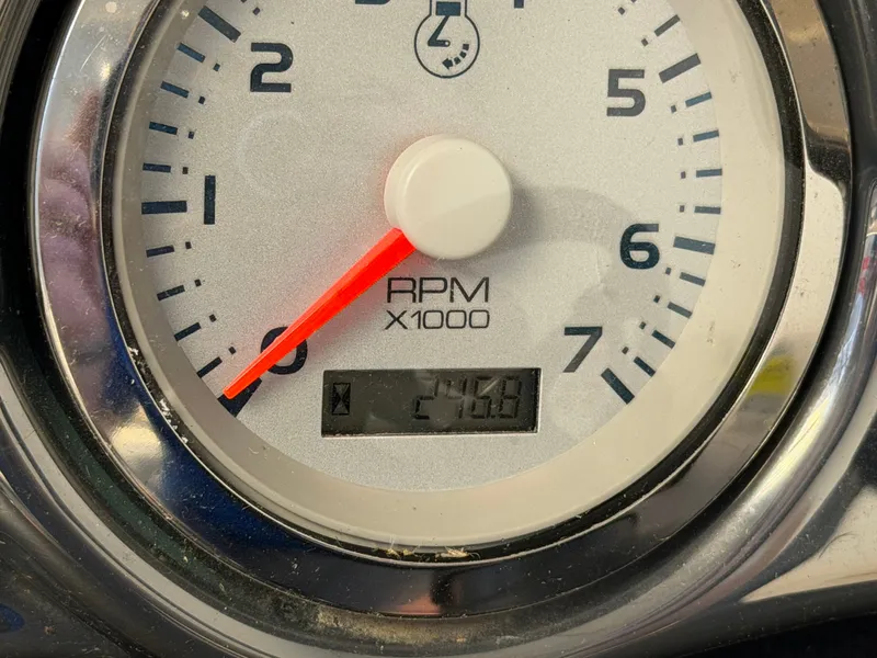 Slide: The Image of A tachometer with a red needle shows 2740.8 revolutions per minute. - 42