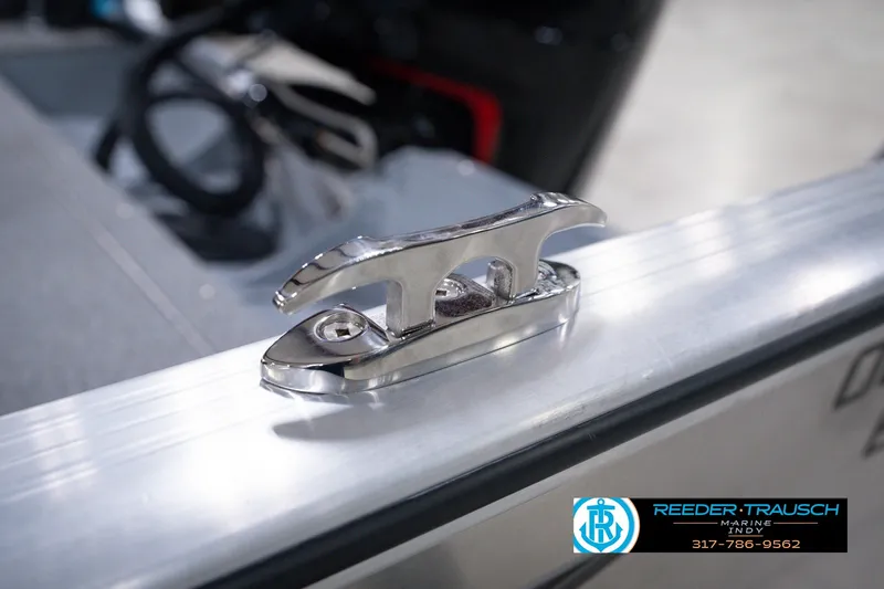 Slide: The Image of Chrome cleat on 2026 Lund 1800 Explorer SS boat, Reeder-Trausch Marine logo visible. - 63