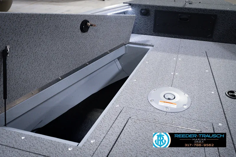 Slide: The Image of 2026 Lund 1800 Explorer SS boat interior storage compartment, featuring durable construction and sleek design. - 69