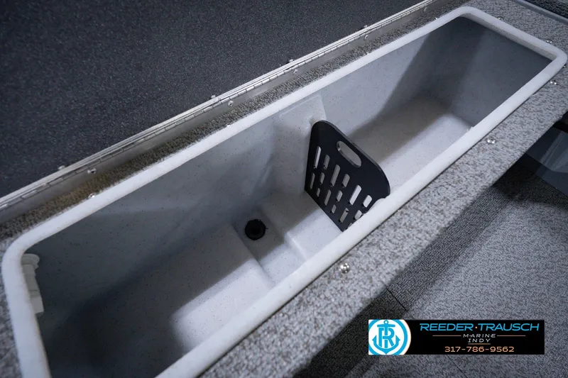 Slide: The Image of 2026 Lund 1800 Explorer SS boat storage compartment with divider, showcased by Reeder Trausch Marine. - 47