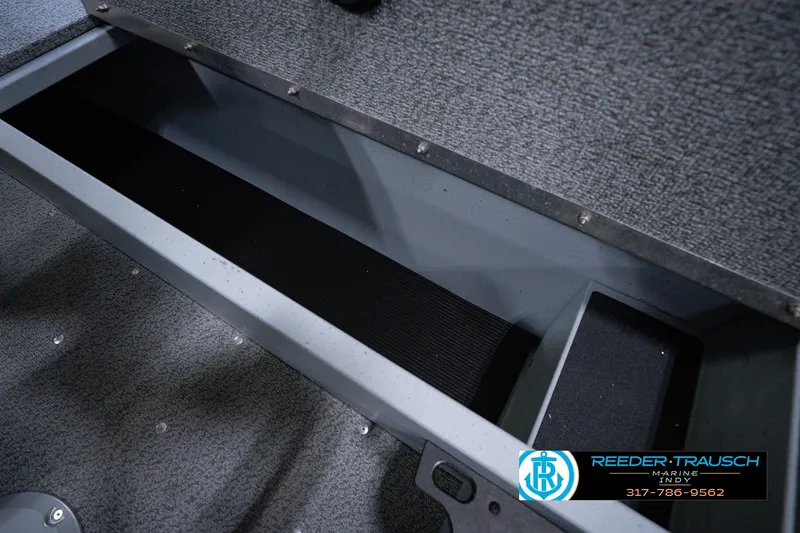 Slide: The Image of Storage compartment of 2026 Lund 1800 Explorer SS boat, featuring durable interior design. - 48