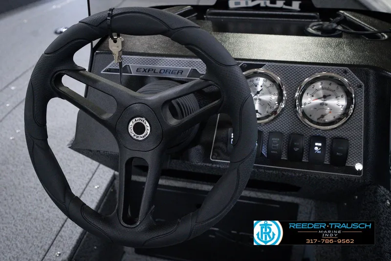 Slide: The Image of Steering wheel and dashboard of 2026 Lund 1800 Explorer SS boat. - 35