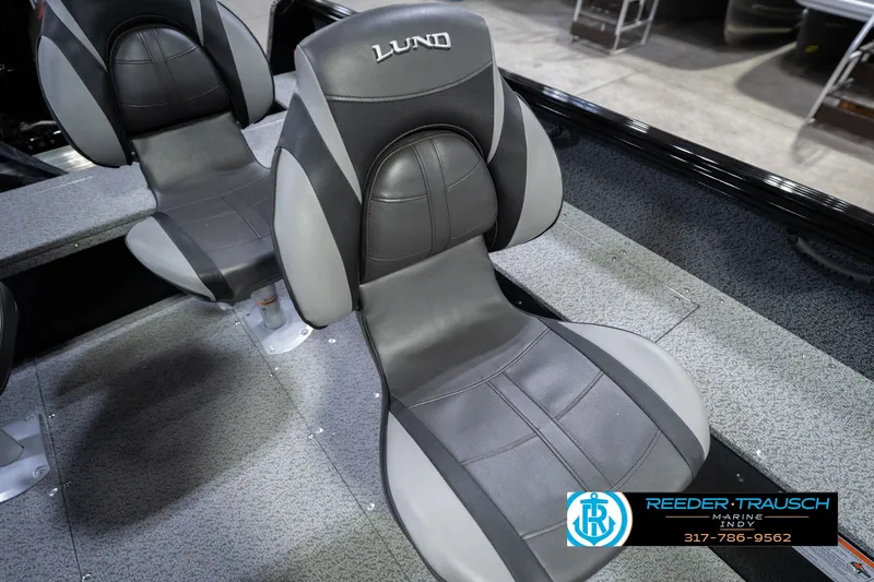 Slide: The Image of 2026 Lund 1800 Explorer SS boat seats, featuring sleek gray and black design. - 67