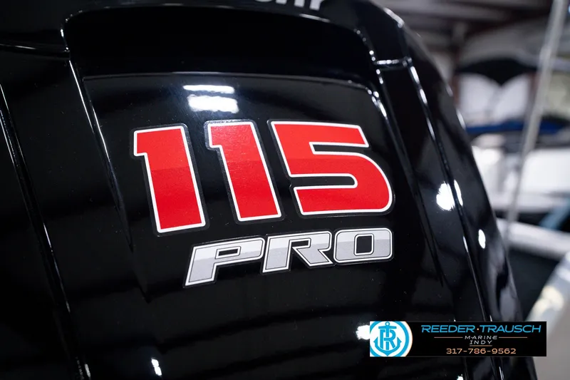 Slide: The Image of Close-up of a 115 Pro engine on a 2026 Lund 1800 Explorer SS boat. - 52