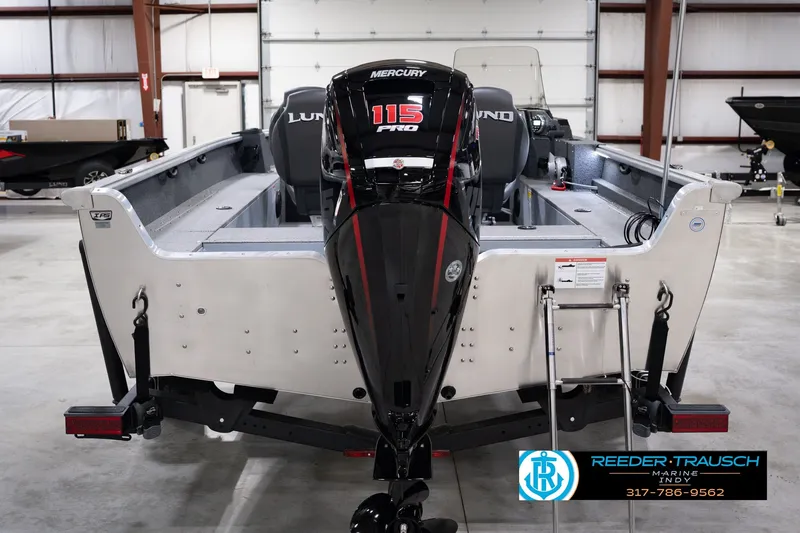 Slide: The Image of 2026 Lund 1800 Explorer SS boat with Mercury 115 Pro XS engine in showroom. - 8