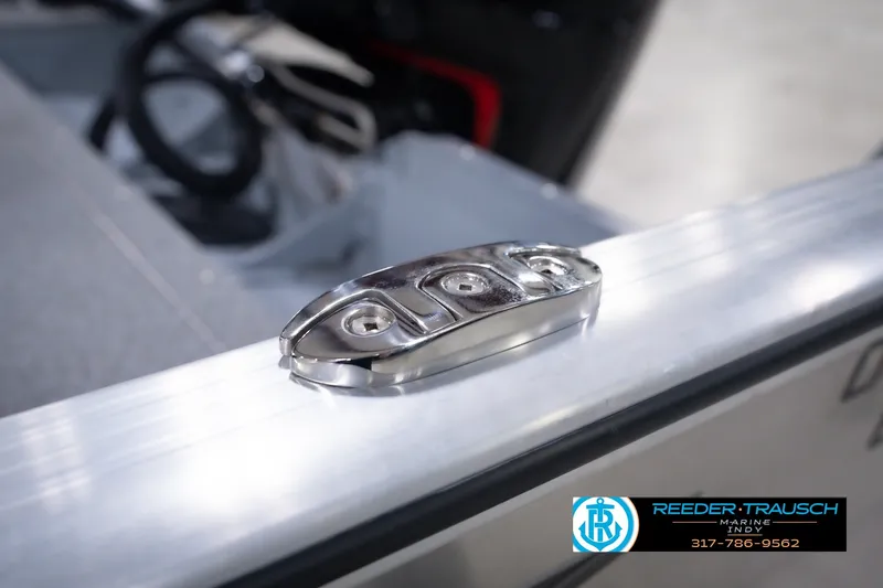 Slide: The Image of 2026 Lund 1800 Explorer SS boat cleat detail, Reeder Trausch Marine logo visible. - 62