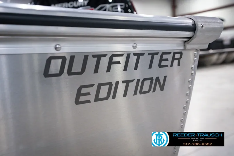 Slide: The Image of 2026 Lund 1800 Explorer SS Outfitter Edition boat detail in showroom. - 61