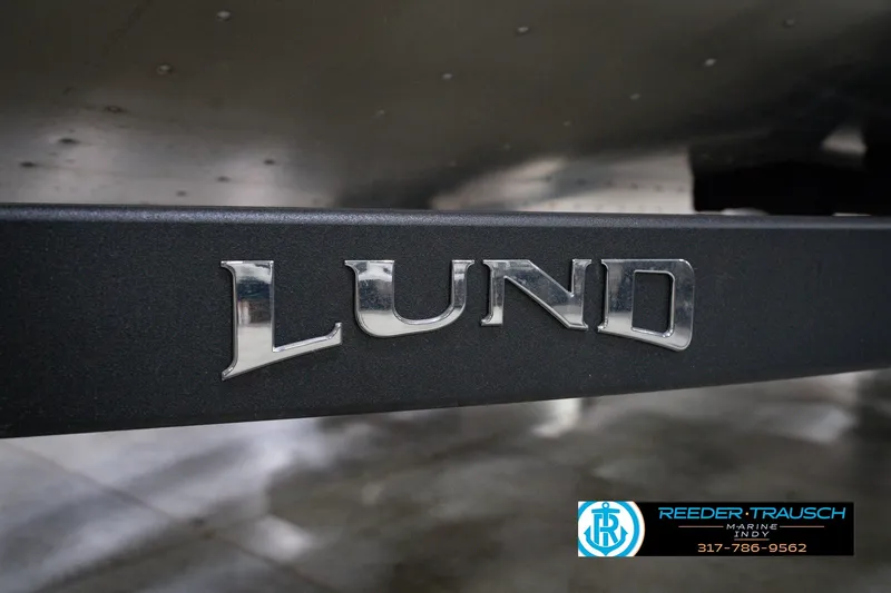 Slide: The Image of 2026 Lund 1800 Explorer SS boat logo with Reeder Trausch Marine contact details. - 55