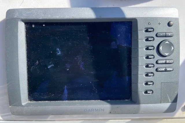 Slide: The Image of Garmin navigation system on 2000 Carver 406 Aft Cabin Motor Yacht dashboard. - 13