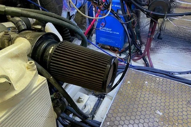 Slide: The Image of Engine room of 2000 Carver 406 Aft Cabin Motor Yacht with visible air filter. - 43