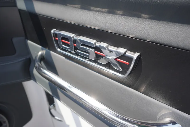 Slide: The Image of Close-up of 2027 Chaparral 270 OSX emblem on sleek interior panel. - 19
