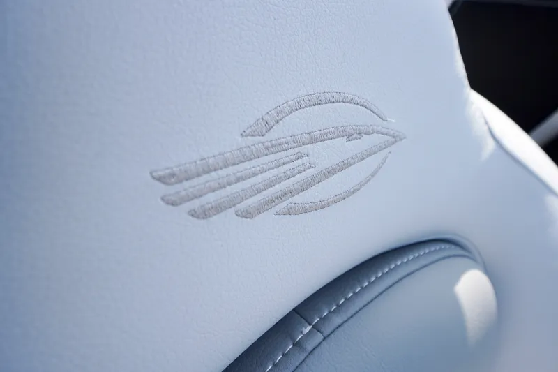 Slide: The Image of Embossed logo on Chaparral 270 OSX 2027 boat seat upholstery. - 47