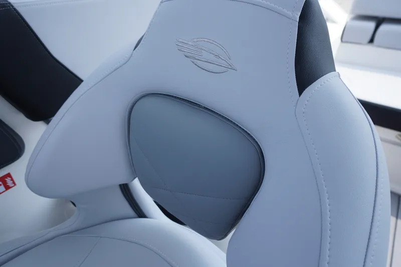 Slide: The Image of Luxurious seating detail of 2027 Chaparral 270 OSX boat, featuring elegant stitching and design. - 34