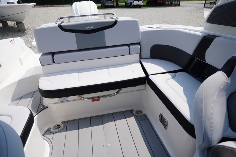 Slide: The Image of 2027 Chaparral 270 OSX boat interior with sleek seating and modern design. - 48
