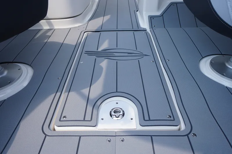 Slide: The Image of 2027 Chaparral 270 OSX boat deck with sleek design and logo detailing. - 43