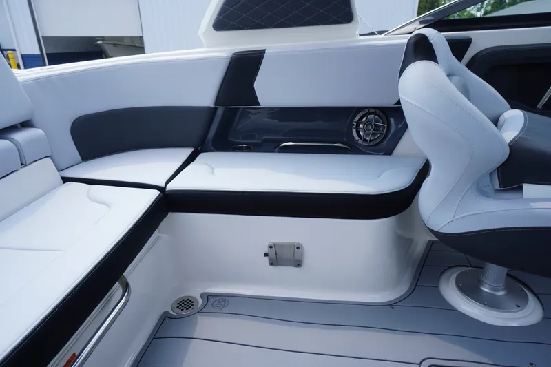 Slide: The Image of Interior of 2027 Chaparral 270 OSX boat with sleek seating and modern design. - 42