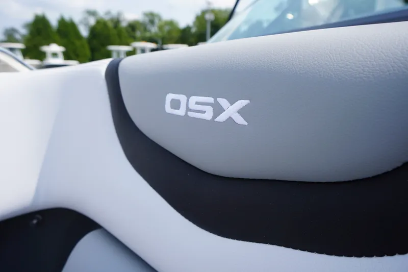 Slide: The Image of Close-up of 2027 Chaparral 270 OSX boat interior with logo detail. - 8
