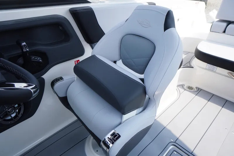 Slide: The Image of 2027 Chaparral 270 OSX boat interior with luxurious seating and modern design. - 33