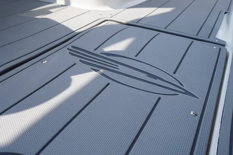 Slide: The Image of Non-slip deck of 2027 Chaparral 270 OSX boat with embossed logo design. - 45