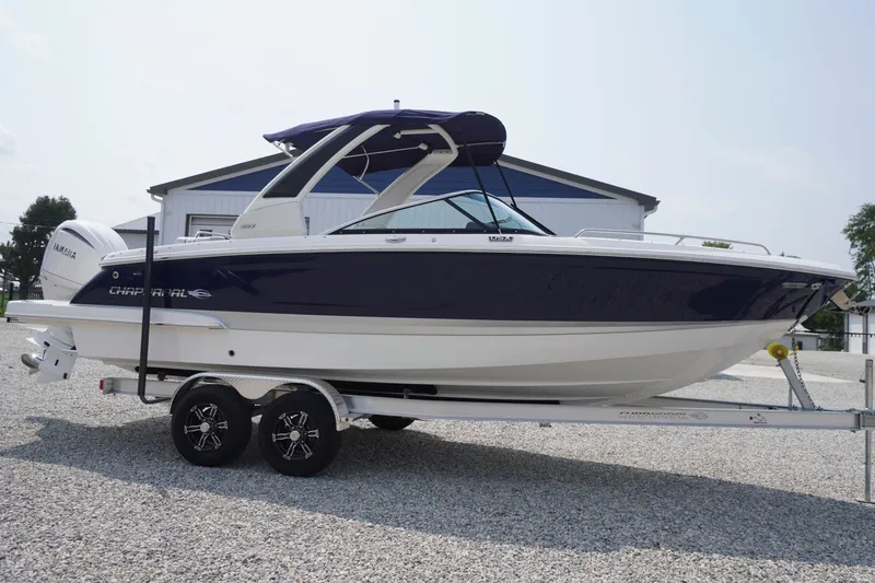 Slide: The Image of 2027 Chaparral 270 OSX boat on trailer, parked outdoors. - 72