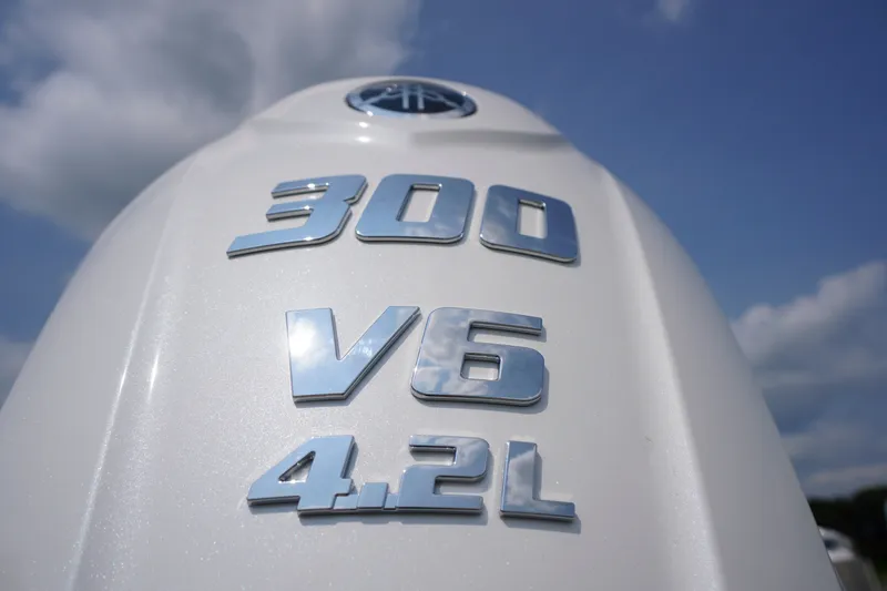 Slide: The Image of Close-up of Chaparral 270 OSX 2027 engine, featuring 300 V6 4.2L badge. - 67