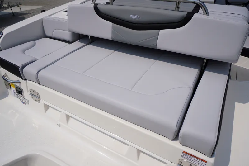 Slide: The Image of 2027 Chaparral 270 OSX boat with luxurious gray seating and sleek design. - 53