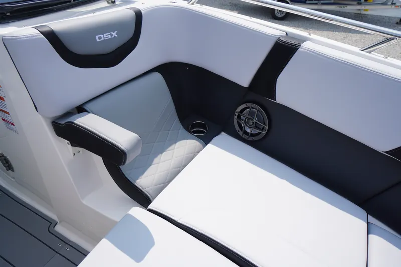 Slide: The Image of Interior seating of 2027 Chaparral 270 OSX boat with sleek design and speaker. - 7
