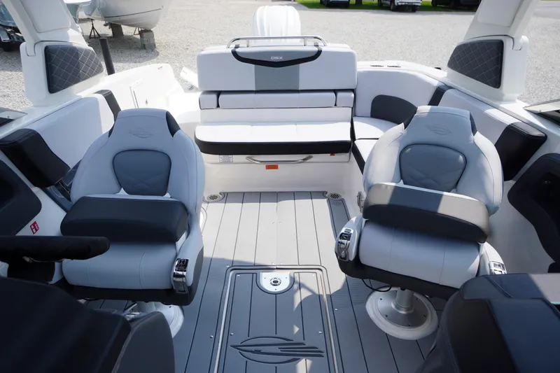 Slide: The Image of Interior of 2027 Chaparral 270 OSX boat with luxurious seating and modern design. - 37