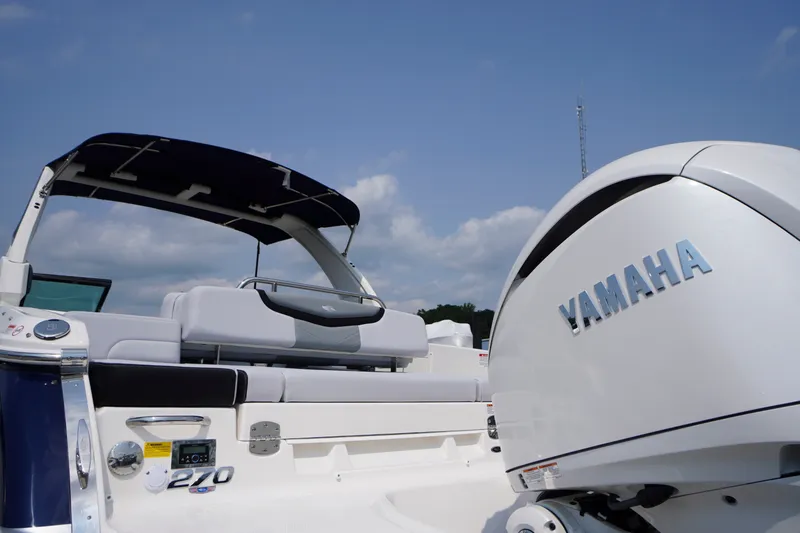 Slide: The Image of Chaparral 270 OSX 2027 boat with Yamaha engine, featuring sleek design and modern amenities. - 63