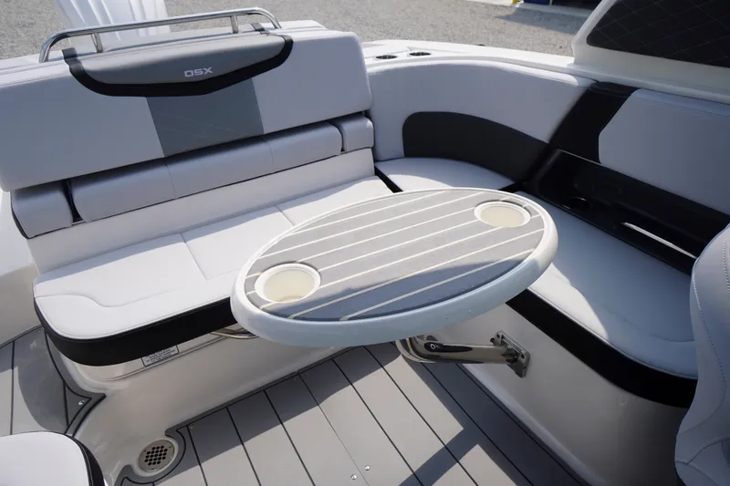 Slide: The Image of Interior of 2027 Chaparral 270 OSX boat with seating and table. - 39