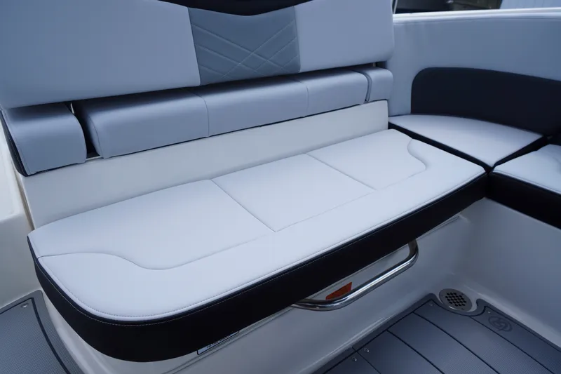 Slide: The Image of 2027 Chaparral 270 OSX boat interior seating, featuring sleek, modern design and comfortable upholstery. - 40