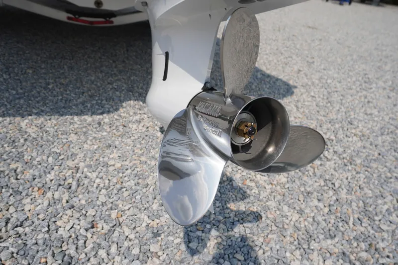 Slide: The Image of Propeller of 2027 Chaparral 270 OSX boat on gravel surface. - 68