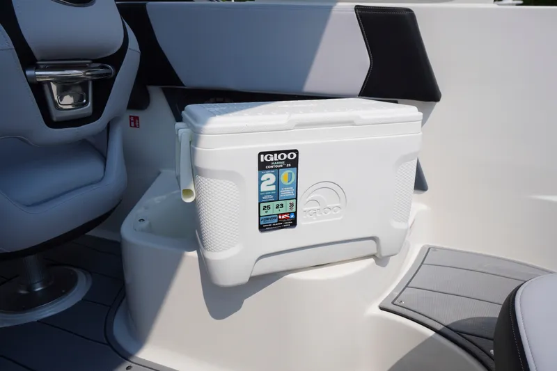 Slide: The Image of Igloo cooler on 2027 Chaparral 270 OSX boat interior, showcasing seating and storage. - 51