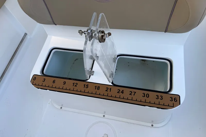 Slide: The Image of 2018 Sea Hunt Gamefish 27 boat with built-in measuring ruler and storage compartments. - 21