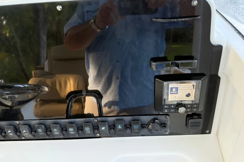 Slide: The Image of Control panel of a 2018 Sea Hunt Gamefish 27 boat with audio system. - 45