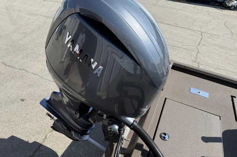 Slide: The Image of Yamaha outboard motor on 2027 Avid 20 Rogue CC boat, parked on concrete. - 17