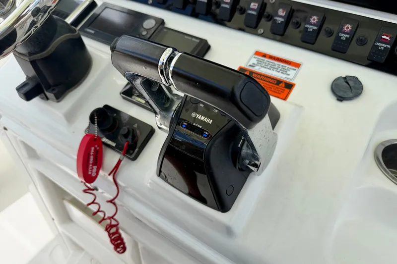 Slide: The Image of Control panel of a 2016 Sea Hunt Gamefish 30 boat with Yamaha throttle. - 22