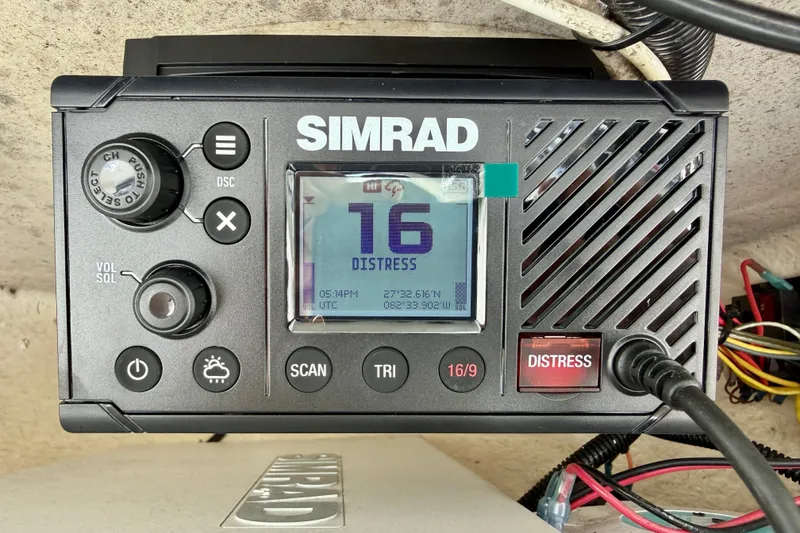 Slide: The Image of Simrad marine radio displaying distress signal on Sea Hunt Gamefish 30, 2016 model. - 20