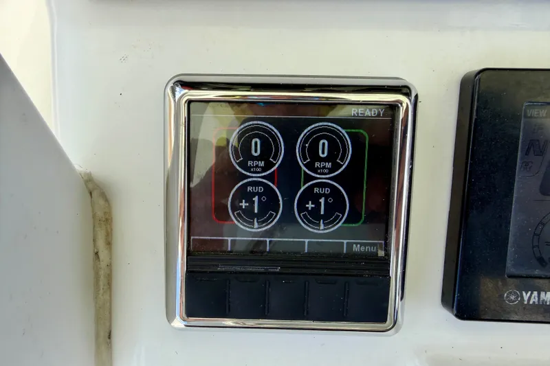 Slide: The Image of Control panel display on a 2016 Sea Hunt Gamefish 30 boat. - 18