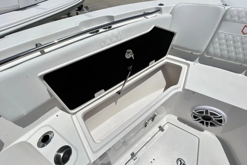 Slide: The Image of Storage compartment on 2027 Sea Fox 328 Commander boat, featuring sleek design and speaker system. - 24